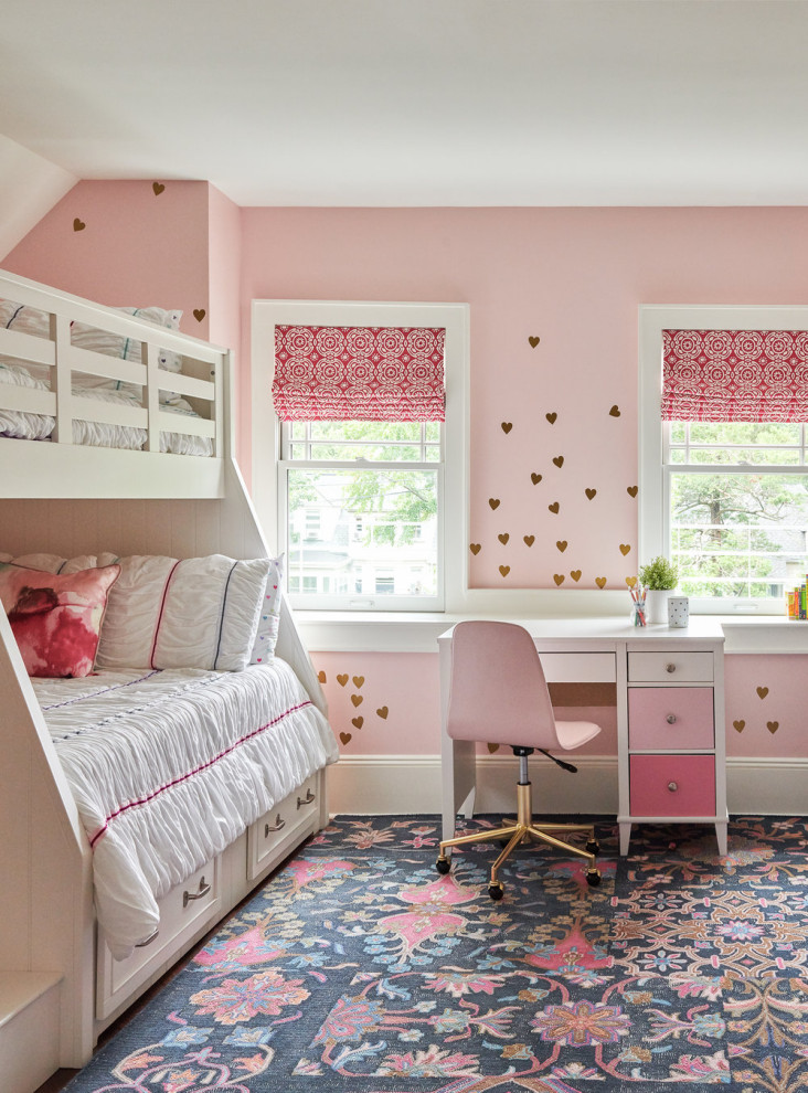 Example of a transitional girl carpeted kids' bedroom design in New York with pink walls