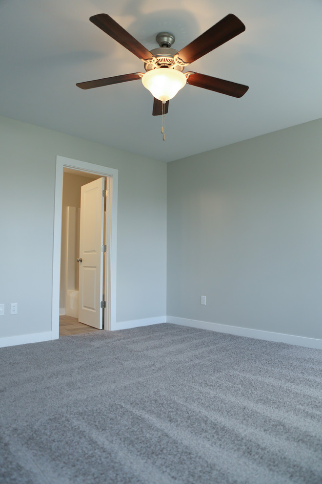 Home design - large transitional guest carpeted home design idea in Chicago with gray walls