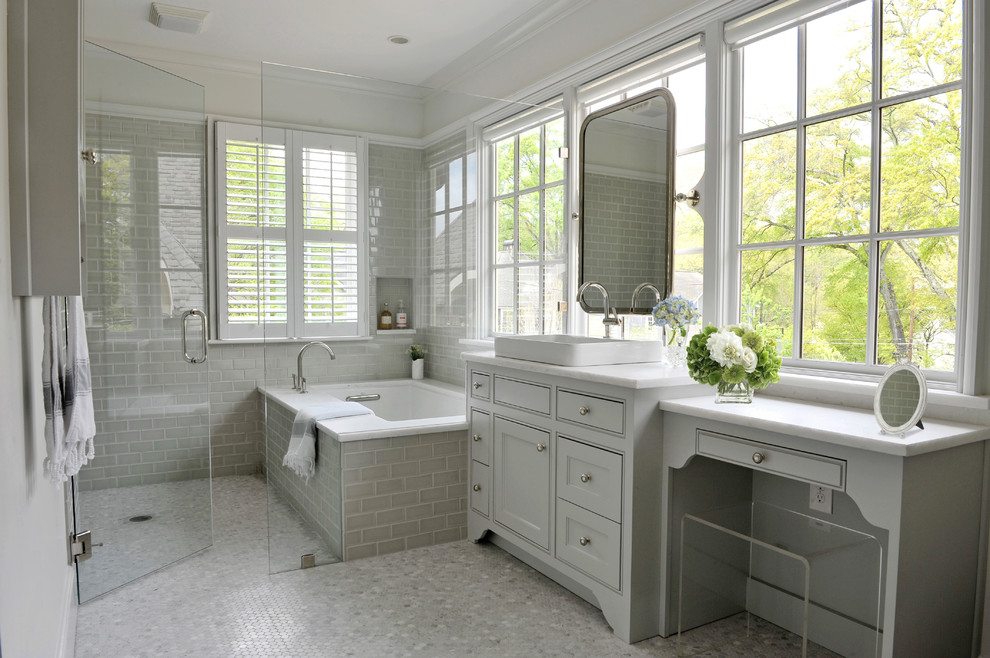 Design ideas for a large modern master bathroom in Atlanta with beaded inset cabinets, grey cabinets, an undermount tub, an alcove shower, gray tile, subway tile, grey walls, mosaic tile floors, a drop-in sink and marble benchtops.