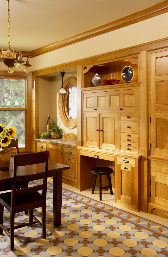 Inspiration for a traditional separate dining room in Minneapolis with beige walls.