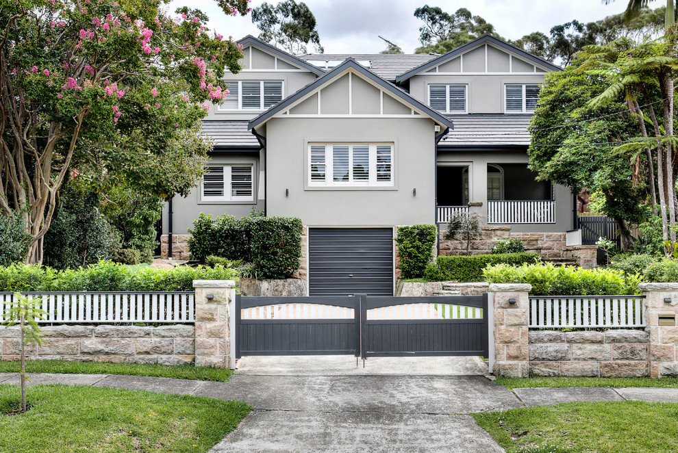 Photo of a transitional two-storey grey exterior in Sydney.