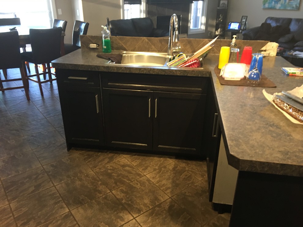 Minimalist kitchen photo in Calgary