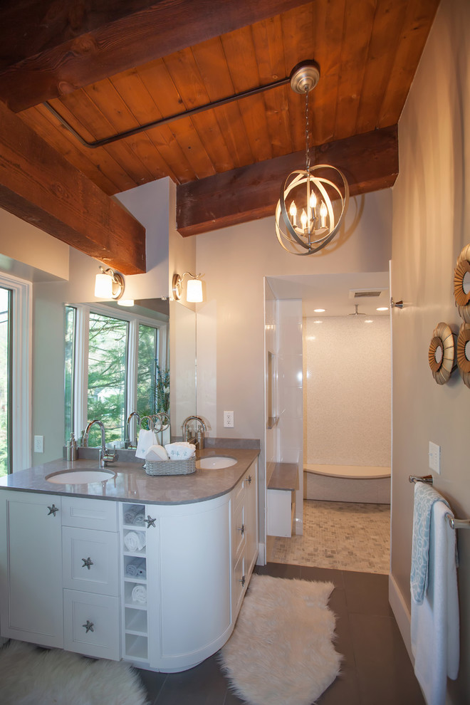 Inspiration for a mid-sized contemporary master bathroom in Boston with flat-panel cabinets, white cabinets, an open shower, a one-piece toilet, white tile, ceramic tile, beige walls, porcelain floors, an undermount sink and engineered quartz benchtops.
