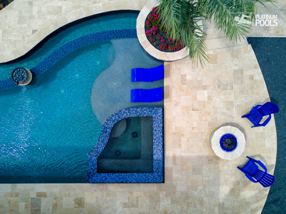 Inspiration for a contemporary backyard custom-shaped pool.