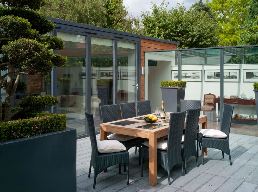 This is an example of a contemporary deck in London with no cover.