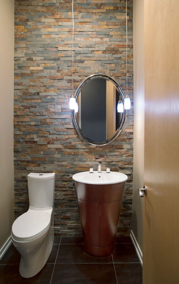Inspiration for a modern powder room in Chicago with slate.