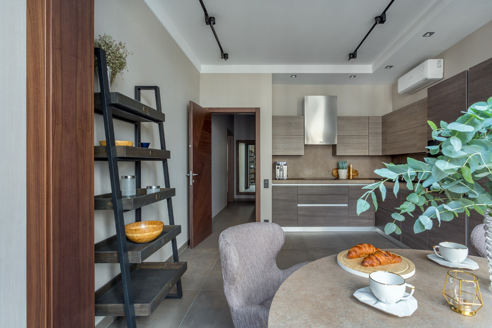 Photo of a large contemporary l-shaped eat-in kitchen in Moscow with a drop-in sink, flat-panel cabinets, brown cabinets, laminate benchtops, beige splashback, stainless steel appliances, porcelain floors, no island, grey floor and beige benchtop.
