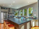 Beach Style Kitchen by Synthesis Architecture