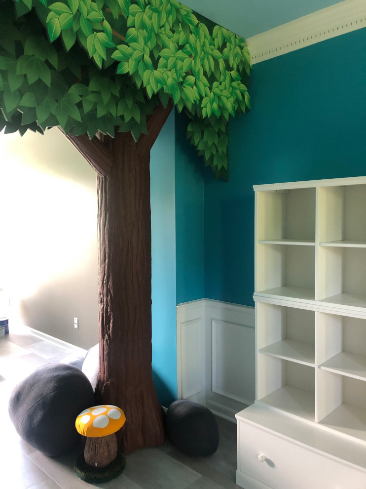 Imagen de dormitorio infantil de 4 a 10 años clásico renovado grande con paredes azules, suelo vinílico, suelo gris, bandeja y boiserie