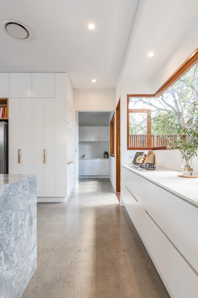 Example of a trendy home design design in Brisbane