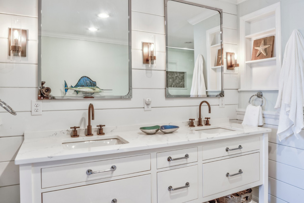 Large beach style master bathroom in Other with flat-panel cabinets, white cabinets, an undermount sink, marble benchtops, white benchtops and a double vanity.
