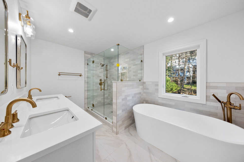 Primary Bath with Freestanding Tub and Gold Filler
