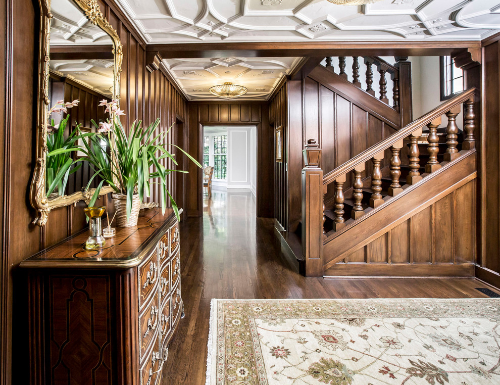 Design ideas for a traditional wood u-shaped staircase in Los Angeles with wood risers and wood railing.