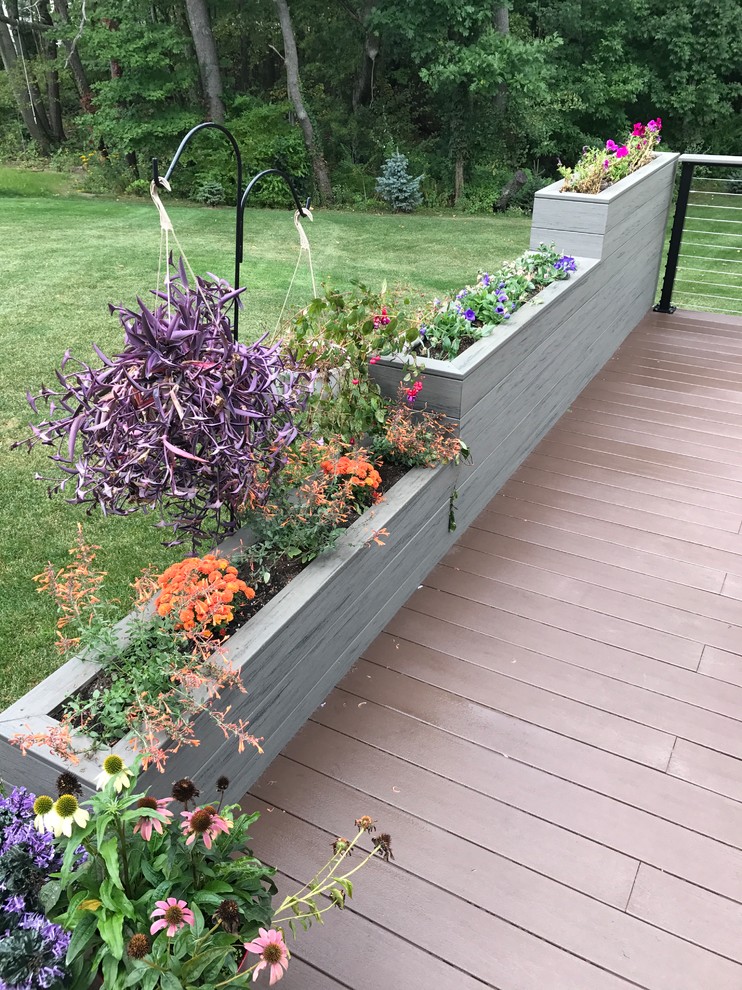 Planter box and composite deck Deck Grand Rapids by Cutting Edge