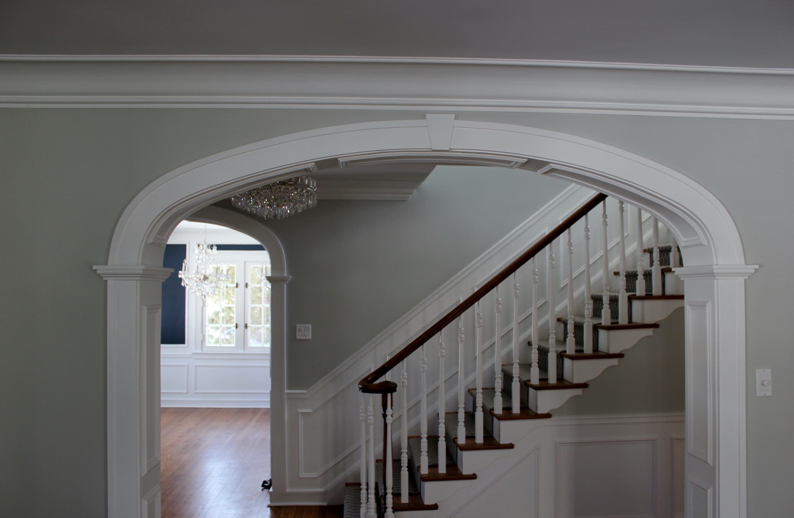 Arched Opening to Foyer & Stair