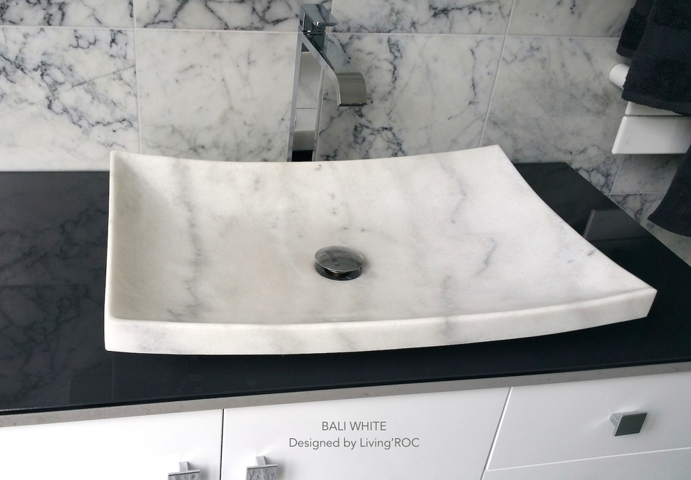 Design ideas for a contemporary master bathroom in Other with a vessel sink.