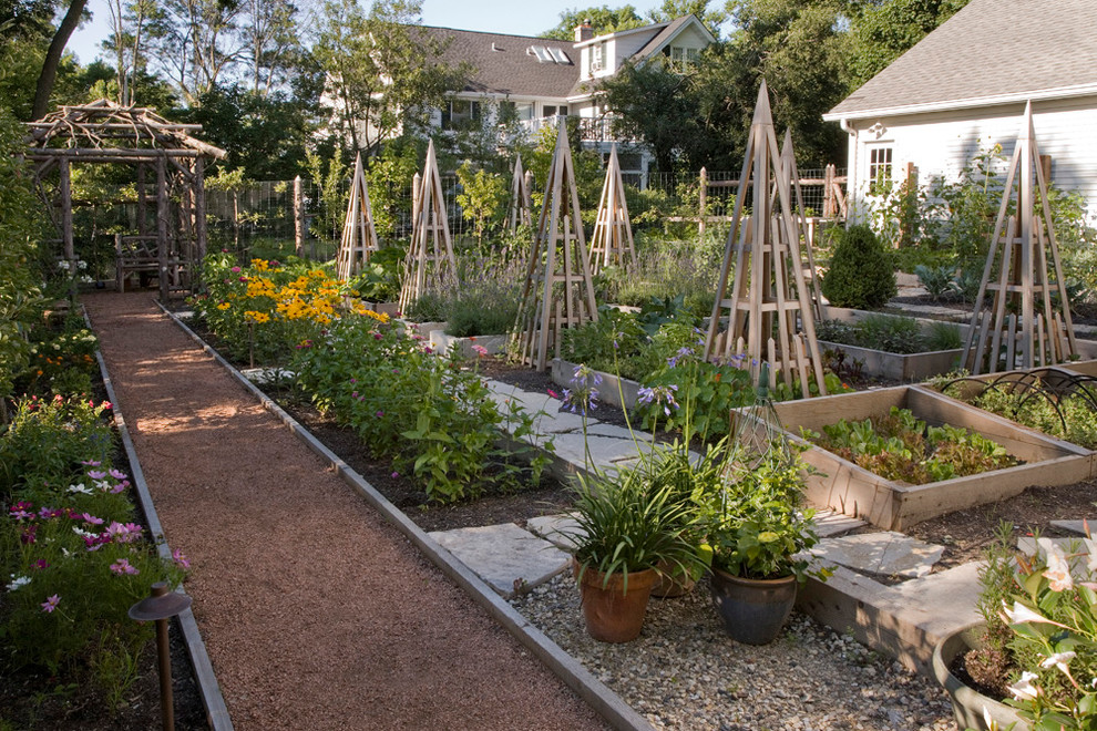 Photo of a large traditional backyard full sun garden for summer in New York with a vegetable garden.