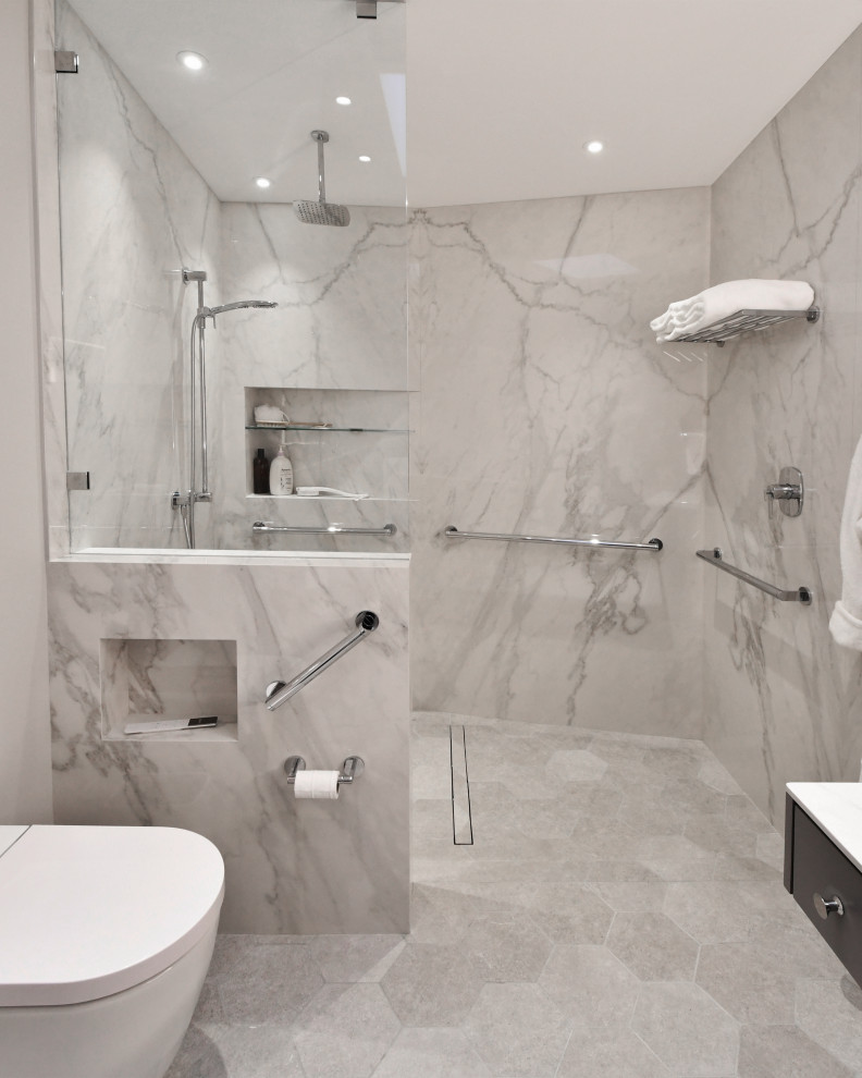 Mid-sized modern master bathroom in Vancouver with flat-panel cabinets, black cabinets, a curbless shower, a bidet, gray tile, mosaic tile, grey walls, laminate floors, an undermount sink, granite benchtops, grey floor, an open shower, white benchtops, a single vanity and a floating vanity.