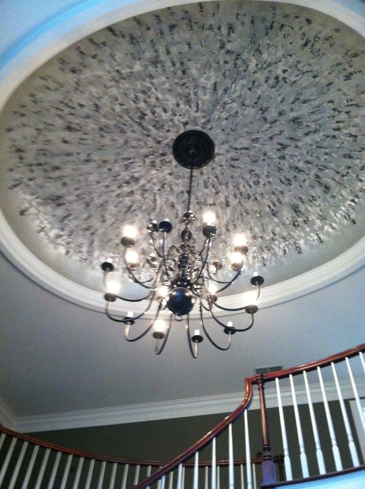 Foyer - large transitional foyer idea in Grand Rapids with brown walls
