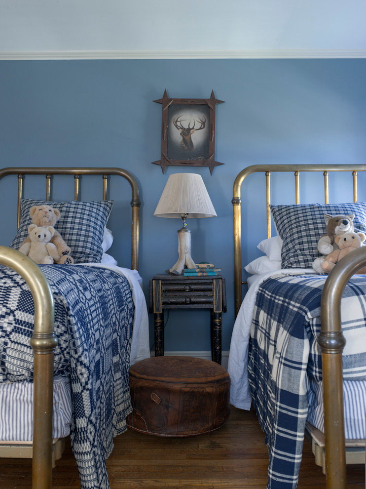 Design ideas for a country kids' bedroom for boys in New York with blue walls and medium hardwood floors.