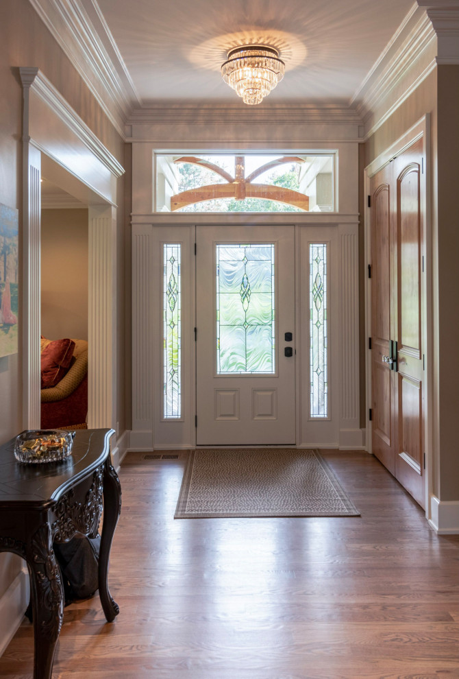 Inspiration for a transitional entryway remodel in Omaha