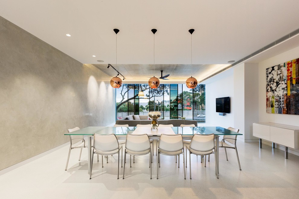 Photo of a contemporary open plan dining in Melbourne with grey walls.