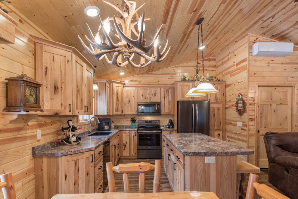 Design ideas for a mid-sized country l-shaped eat-in kitchen in Minneapolis with an undermount sink, shaker cabinets, medium wood cabinets, laminate benchtops, stainless steel appliances, linoleum floors, with island, multi-coloured floor and turquoise benchtop.