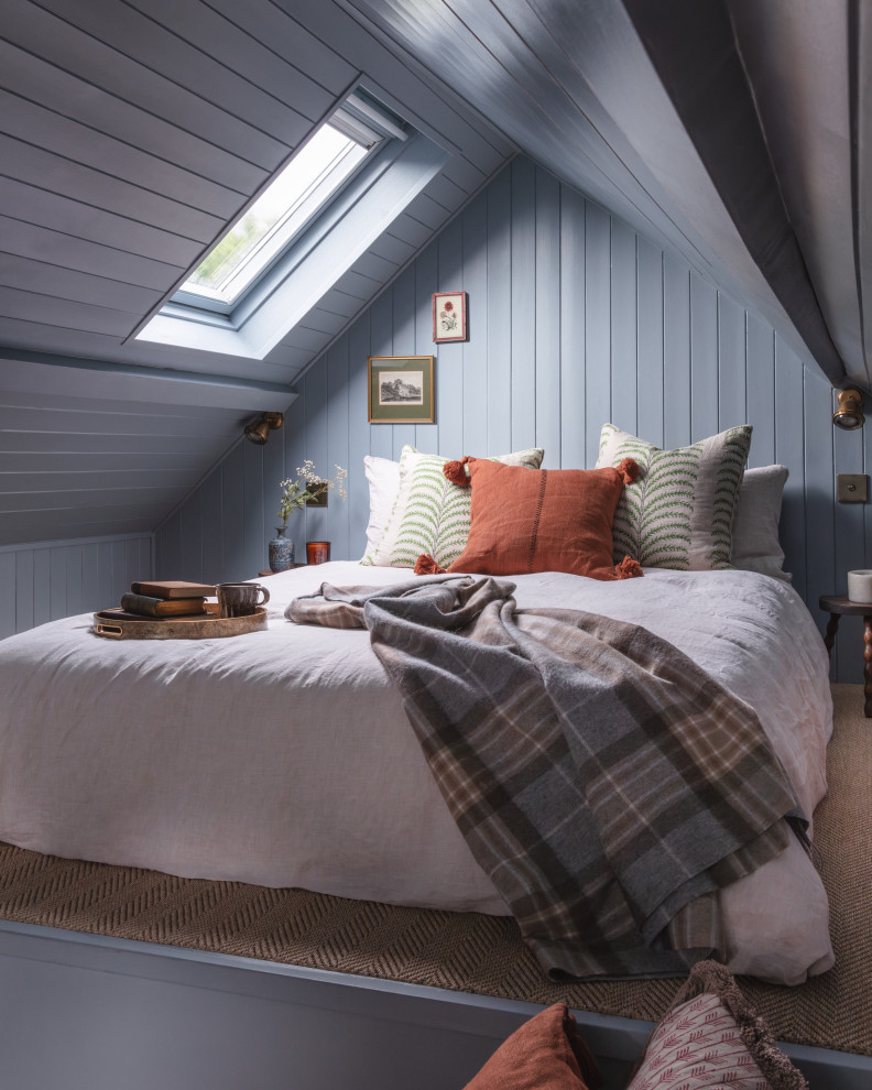 Bedroom - traditional guest vaulted ceiling and shiplap wall bedroom idea in London with blue walls