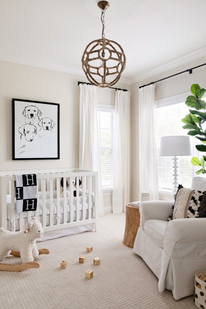 Design ideas for a mid-sized transitional nursery for boys in Orlando with beige walls, carpet, beige floor and wallpaper.