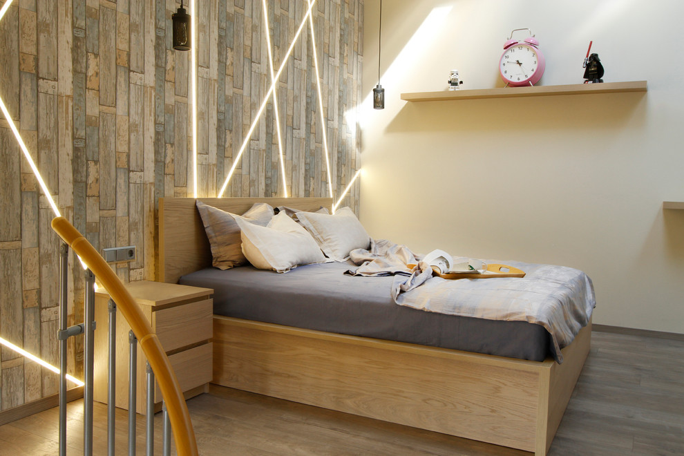 Contemporary kids' bedroom in Moscow with beige walls, brown floor and light hardwood floors.