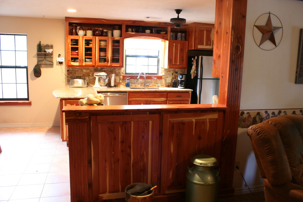 Example of a mountain style kitchen design in Austin