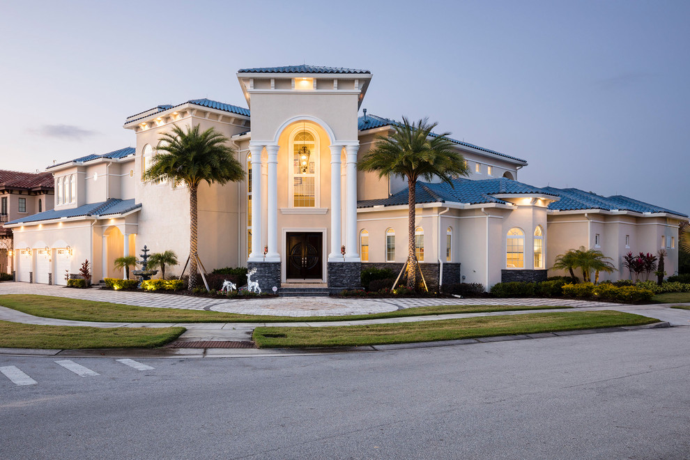 Tuscan home design photo in Orlando