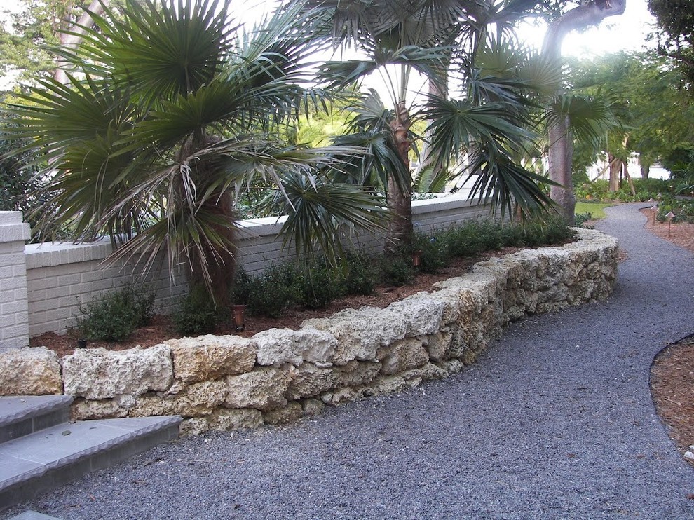 Photo of a transitional stone landscaping in Miami.
