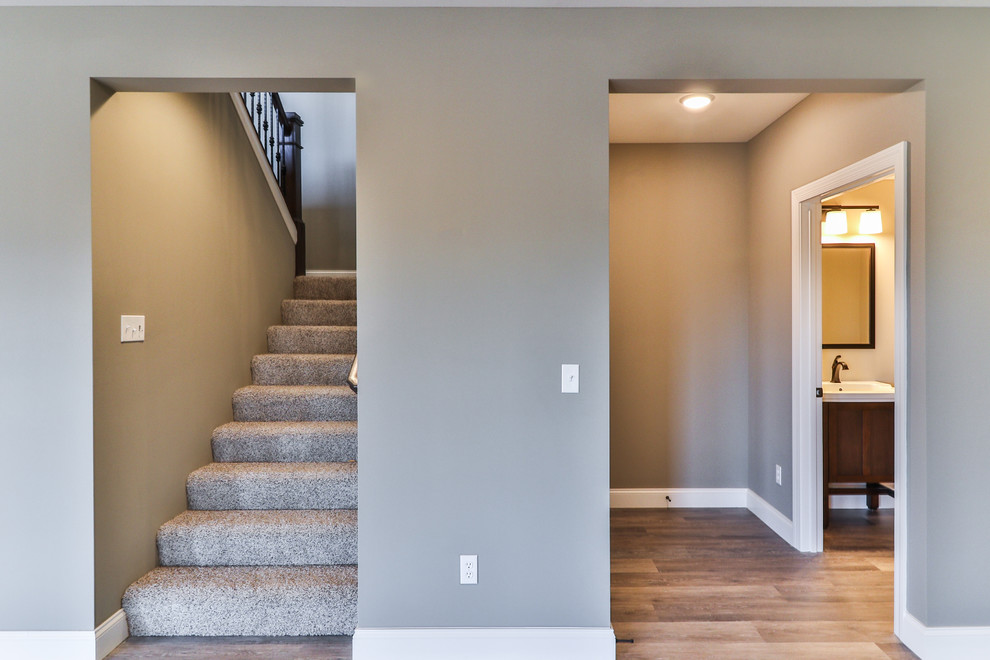 This is an example of a mid-sized transitional staircase in St Louis.
