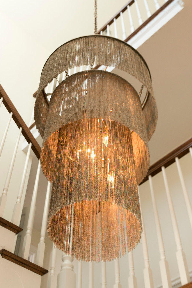 Example of a mid-sized transitional l-shaped wood railing staircase design in Philadelphia