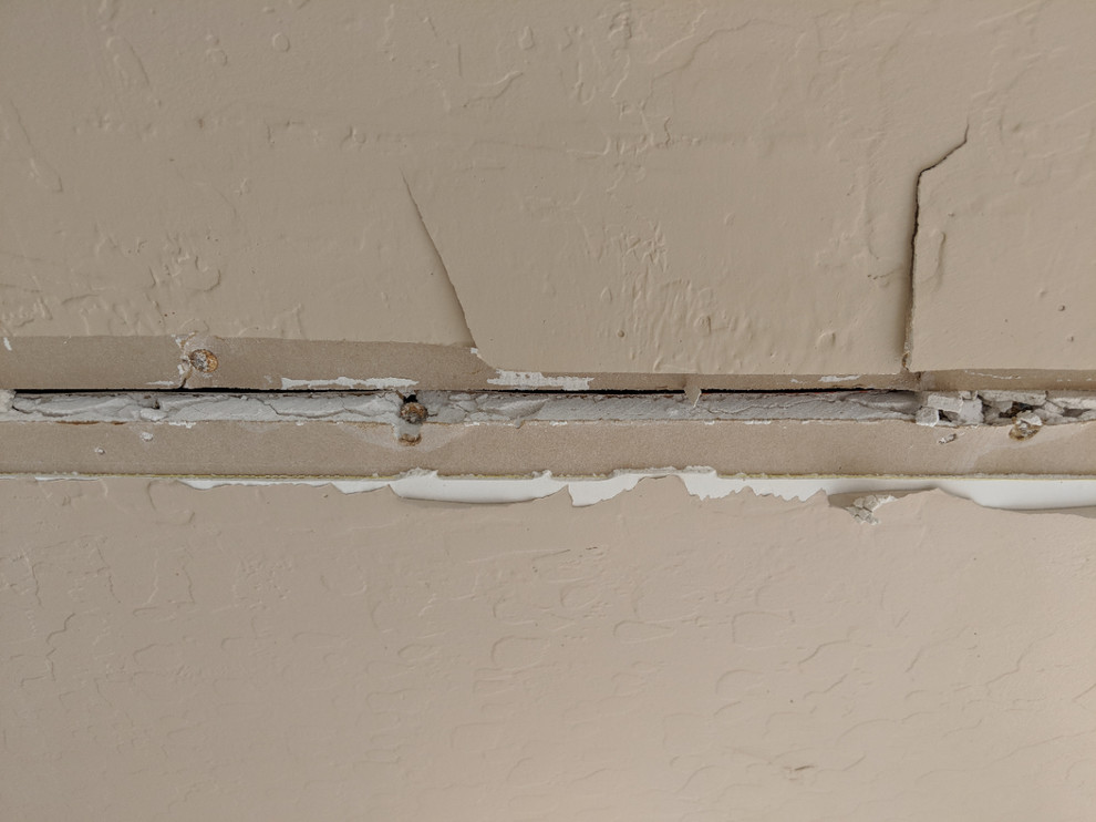 Sagging drywall ceiling joints on back patio