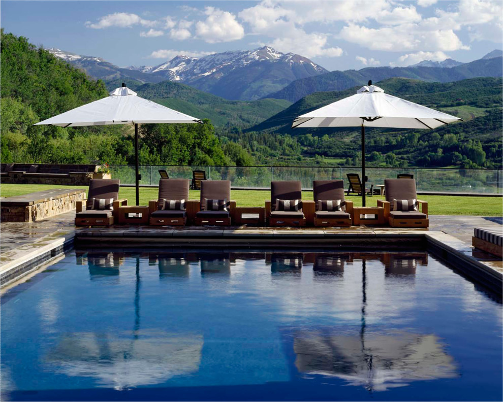 Inspiration for a rustic pool remodel in Denver