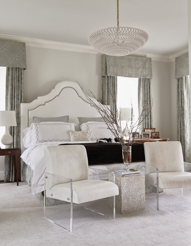 Inspiration for a transitional master bedroom in Raleigh with grey walls and carpet.