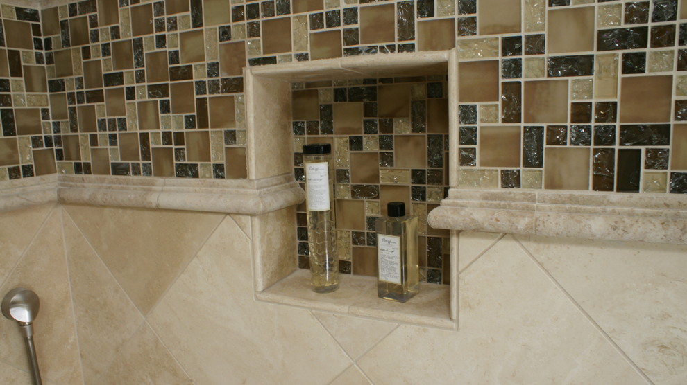 This is an example of a mid-sized traditional master bathroom in San Francisco with a corner shower, multi-coloured tile and mosaic tile.