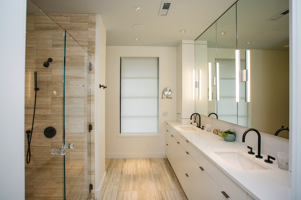 Photo of a mid-sized modern master bathroom in Portland with white cabinets, a curbless shower, white benchtops, a double vanity, a built-in vanity, white walls, laminate floors, an undermount sink, brown floor and a hinged shower door.
