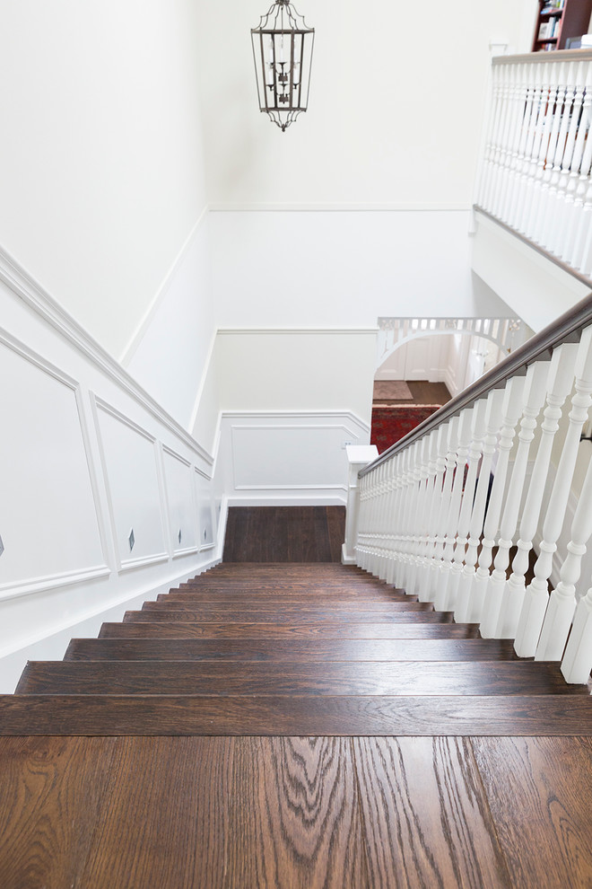 Design ideas for a mid-sized traditional wood straight staircase in Melbourne with wood risers.