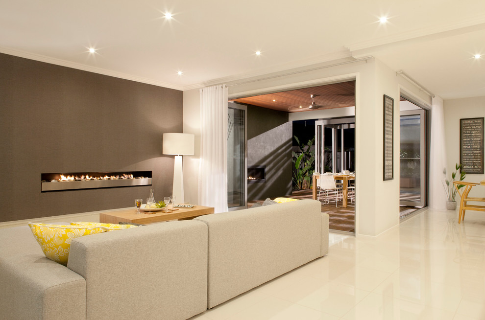 Photo of a contemporary open concept living room in Melbourne with a ribbon fireplace.