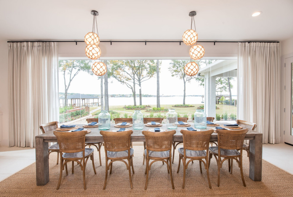 Idée de décoration pour une grande salle à manger ouverte sur la cuisine marine.