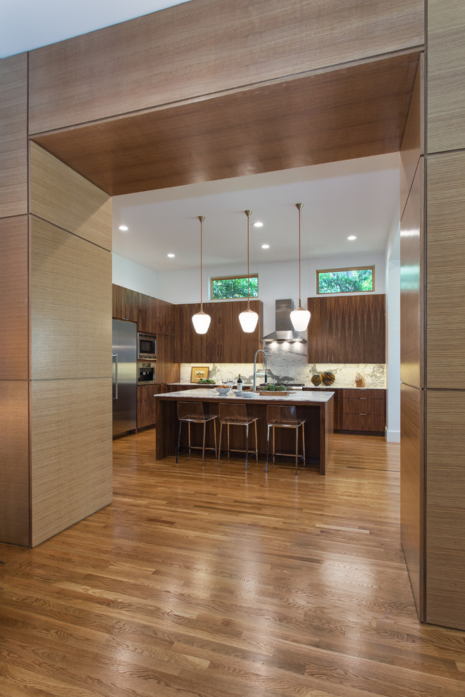 Photo of a contemporary kitchen in Austin with medium hardwood floors.