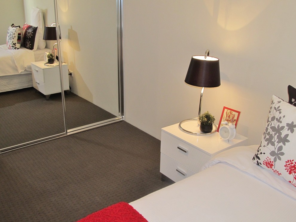 This is an example of a contemporary bedroom in Perth.