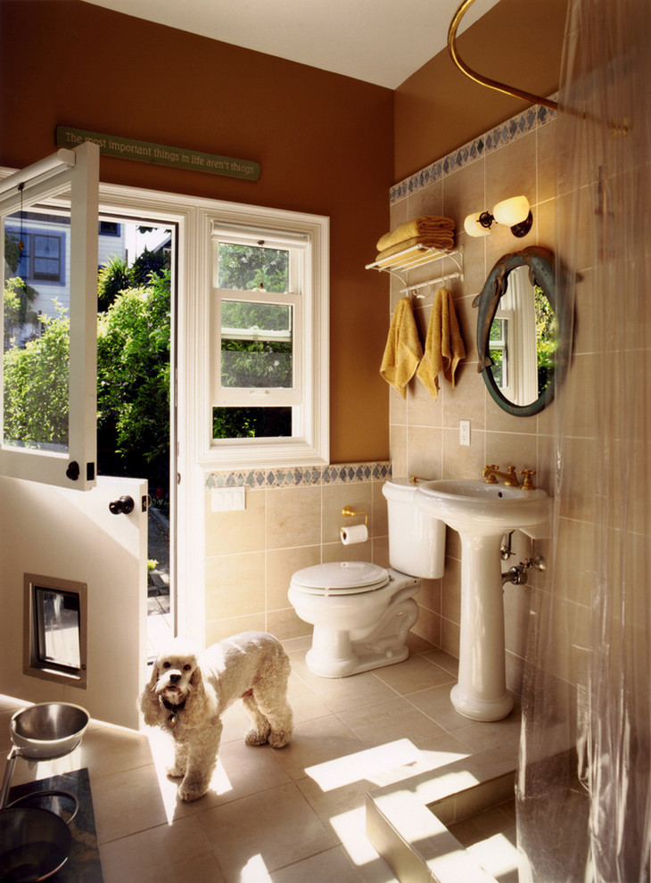 Photo of a mid-sized traditional bathroom in Auckland with a pedestal sink, a two-piece toilet, beige tile, porcelain tile, brown walls and porcelain floors.