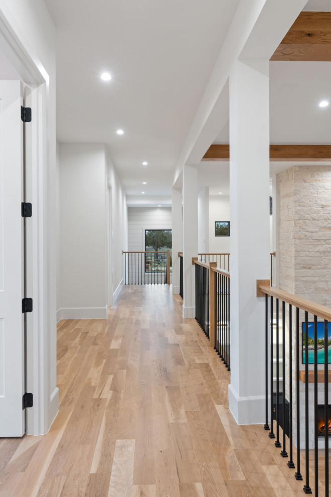 Example of a transitional hallway design in Dallas