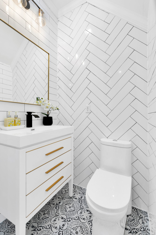 Design ideas for a small midcentury powder room in New York with beaded inset cabinets, white cabinets, a one-piece toilet, white tile, ceramic tile, white walls, cement tiles, an integrated sink, solid surface benchtops, black floor, white benchtops and a freestanding vanity.
