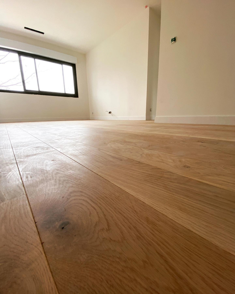 Pose d’un parquet collé en lame
