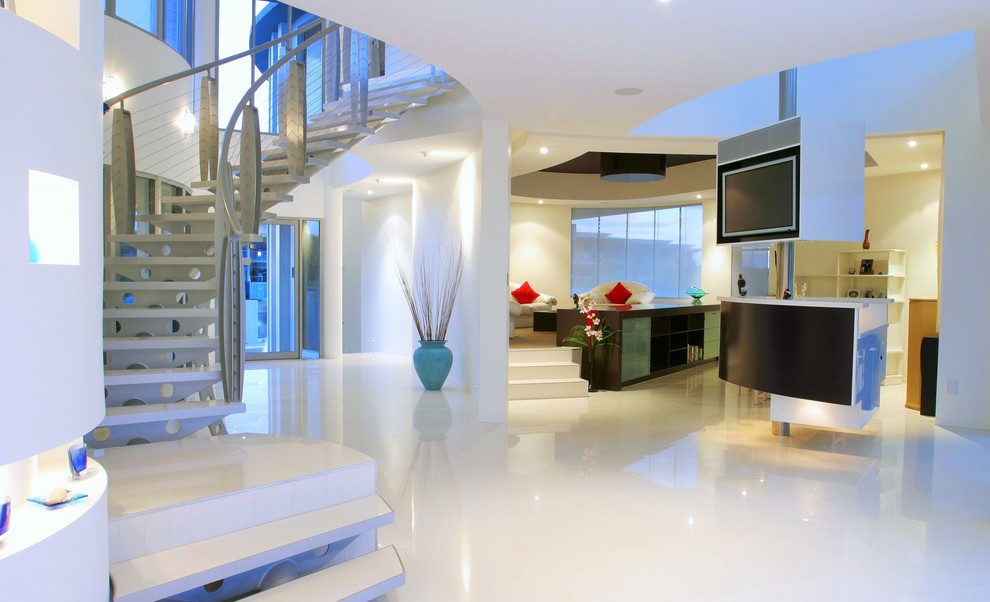 Large contemporary metal curved staircase in Sunshine Coast with metal risers.